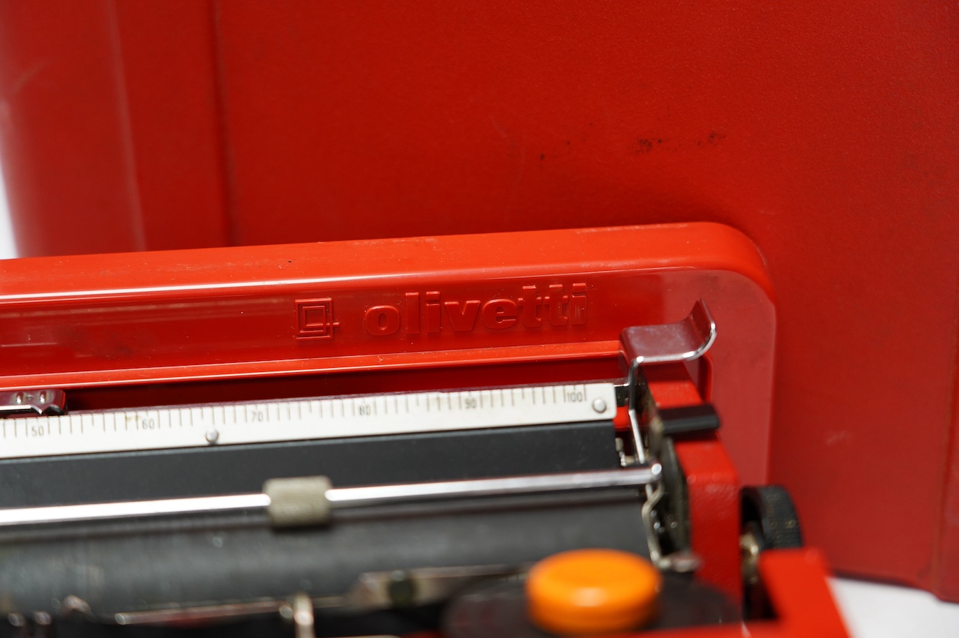 An Olivetti Valentine portable typewriter, designed by Ettore Sottsass & Perry, in its case. Condition - fair, some wear and scuffing to the plastic body and case